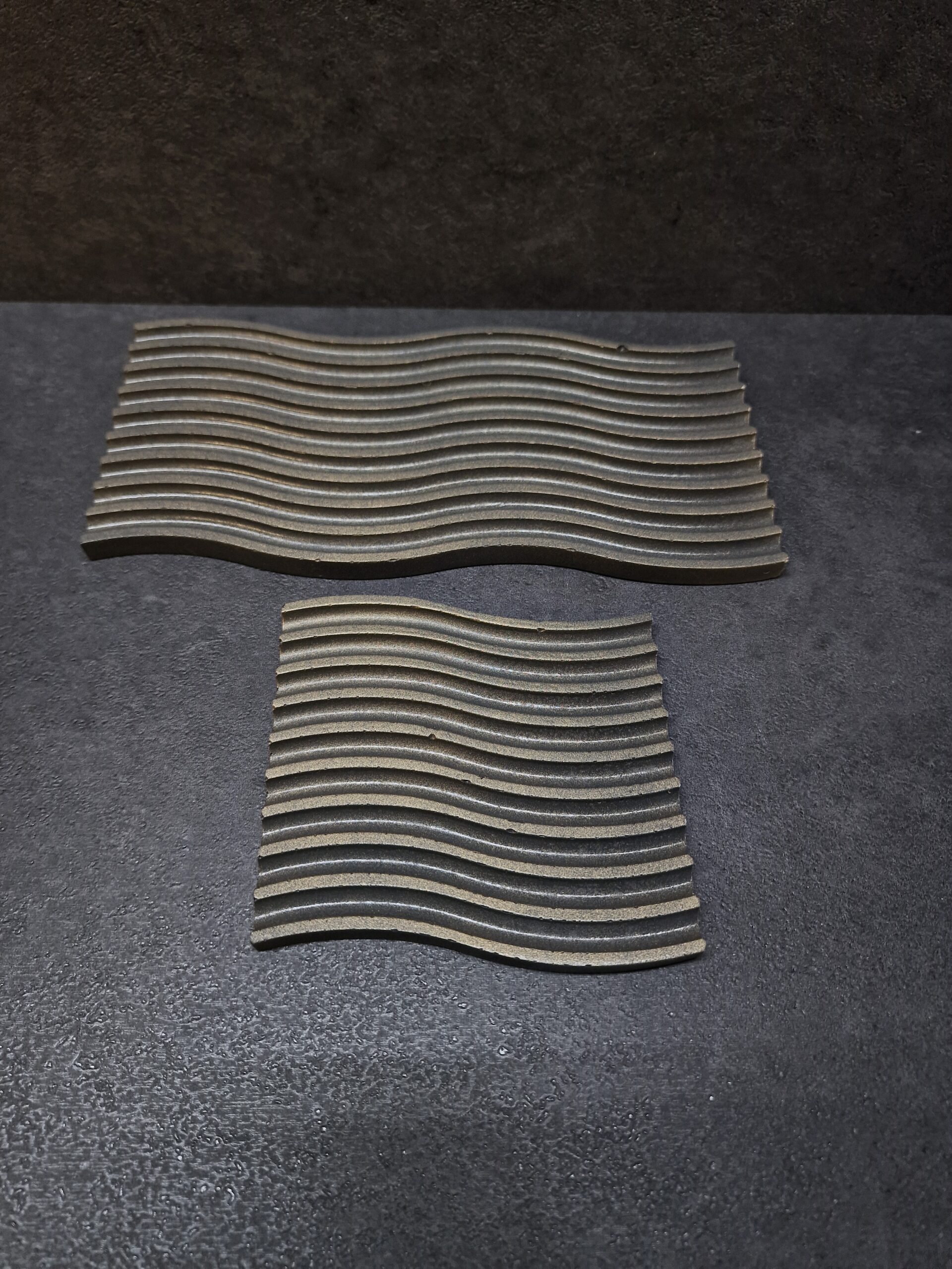 padekliukas banga abu juoda-auksas1