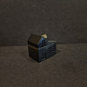 namelis didelis juodas auksas